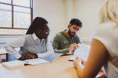 Undergraduate students offering legal advice in a law clinic